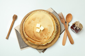 Concept of tasty food with crepes on white background