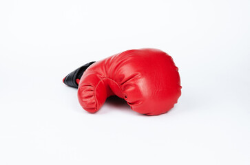 Red boxing glove on a white background.