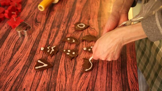 Making cookies. Molding cookie dough. Female hands making cookies on table in kitchen (Soviet Union old flat)