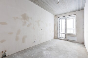 interior of the apartment without decoration in gray colors