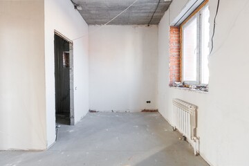 Fototapeta premium interior of the apartment without decoration in gray colors