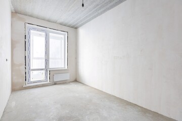 interior of the apartment without decoration in gray colors