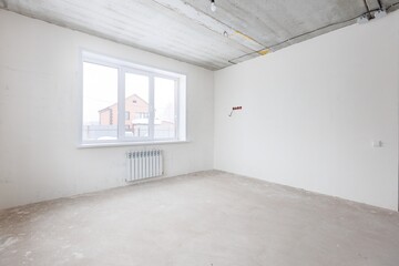 Obraz premium interior of the apartment without decoration in gray colors