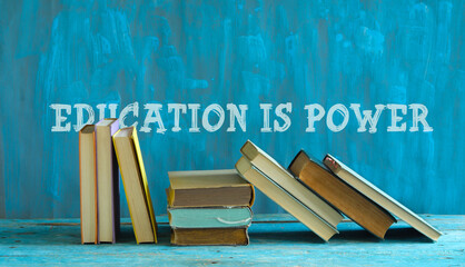 Row of books and saying education is power, education reading,learning concept