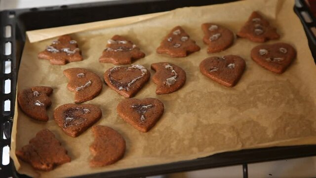 Making cookies. Molding cookie dough. Female hands making cookies on table in kitchen (Soviet Union old flat)