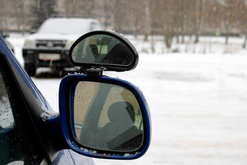 Additional side mirror for car close up