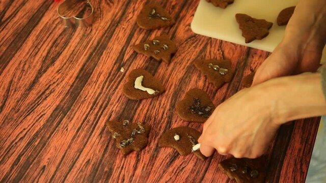 Making cookies. Molding cookie dough. Female hands making cookies on table in kitchen (Soviet Union old flat)