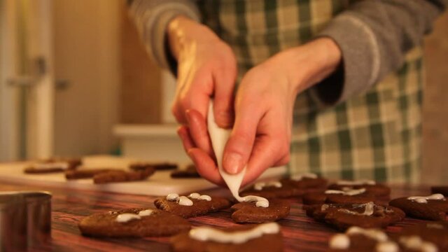 Making cookies. Molding cookie dough. Female hands making cookies on table in kitchen (Soviet Union old flat)