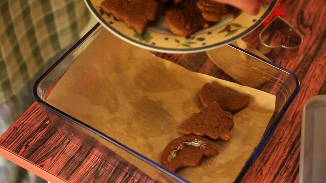Making cookies. Molding cookie dough. Female hands making cookies on table in kitchen (Soviet Union old flat)