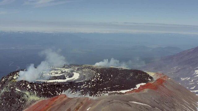 2 Volcanos: Orbiting over Avachinsky crater with Koryaksky on the Background
