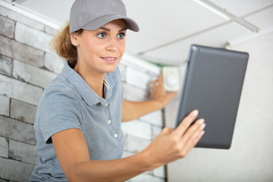 portrait of young woman worker with tablet pc