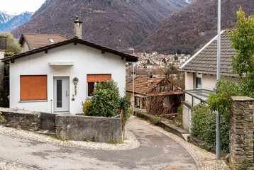 Fototapeta na wymiar Street in the small village Gorduno, district of Bellinzona, Canton of Ticino in Switzerland.