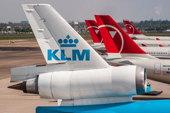 Some Tails from different airplanes on a bright and sunny day