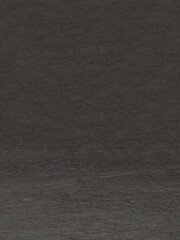 Photo of empty black stone or granite table top isolated on checkered background including clipping path