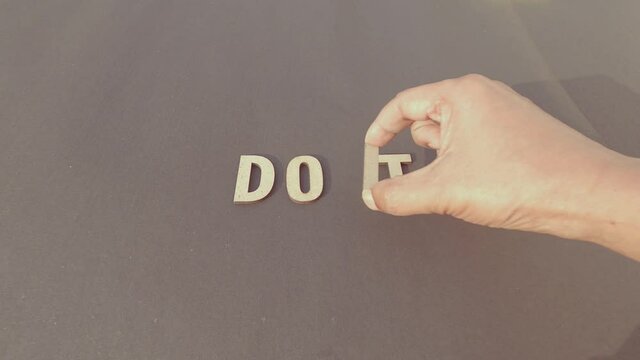 Do it Negative thoughts - Removing the letter I from Do It and replacing N to say Don't. Uncertainty, reluctance, unwillingness, hesitation, negative, thinking to achieve results in business concept.
