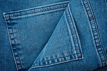 Naklejka premium Close up of blue denim texture with sewing.