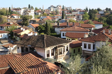 Fototapeta na wymiar Antalya, Turkey - 20 July 2021: Top view of red roofs old city center.
