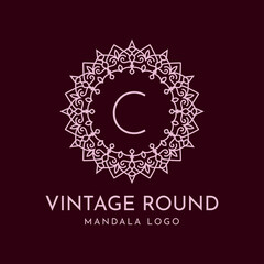 letter C vintage round mandala abstract flower decoration vector logo design