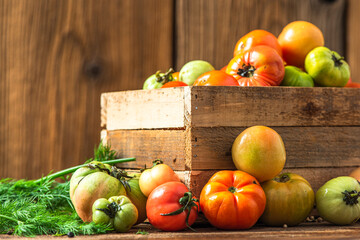 Fresh Ripe Tomatoes in Wooden Box