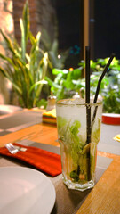 mojito cocktail on the table in the cafe in the bar refreshing drink