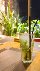 mojito cocktail on the table in the cafe in the bar refreshing drink