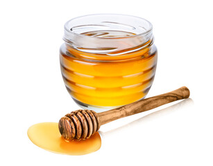 Glass jar with honey and wooden honey dipper isolated on white background
