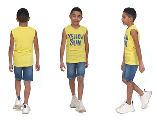 various poses of  same  boy dressed in shorts and sleeveless walking on white background
