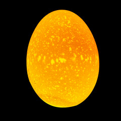 Luminous glowing egg in a bright beam of light passing through. Isolated on black.