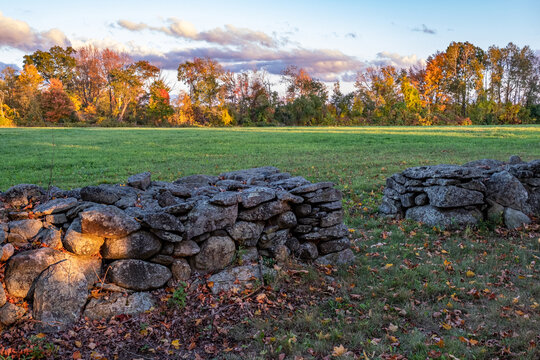 Farmer's fields bordered by stonewalls in the rural town of Hardwick, Massachusetts in the fall.
