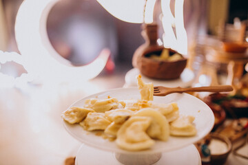 Wedding food tables at a restaurant with decorations