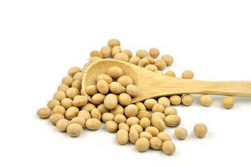 Soybeans on wooden spoon  isolated on white background
