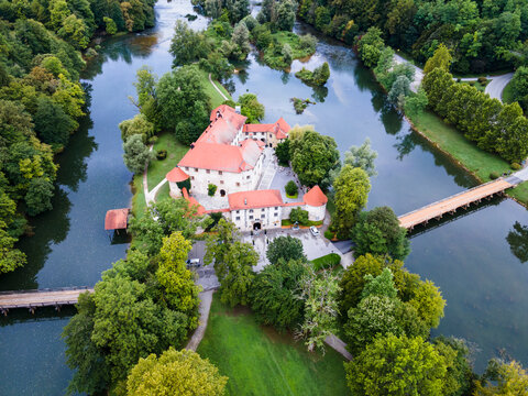 Otocec Castle on Krka River in Slovenia. Drone View