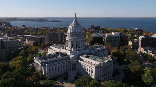 Wisconsin State Capitol Building Surrounded by Autumn Colors in Madison, Wisconsin (Drone - Left to Right Wide Shot)
