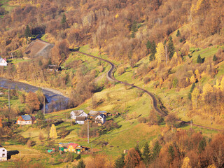 Carpatian village at mountains at the sunny day