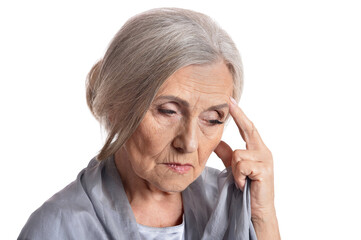 Portrait of sad senior woman posing isolated on white background