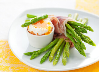 Asparagus ,egg and  ham on plate for breakfast