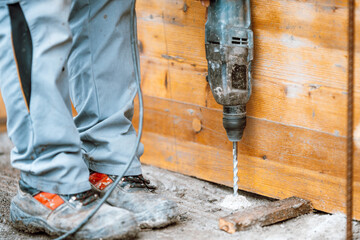 close up details of machinery masonry rotary drill on construction site, concrete details