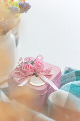 A pink gift box on the table