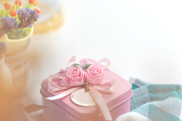 A pink gift box on the table