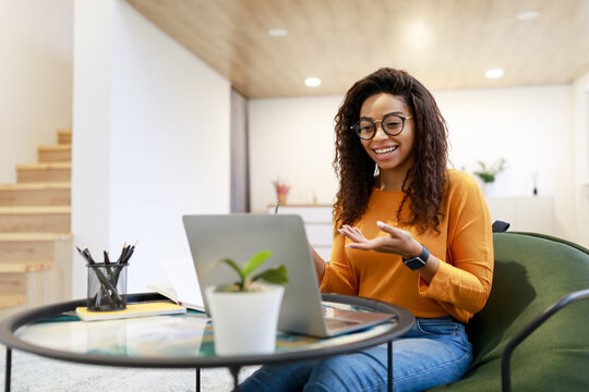 Black Woman Having Video Call Using Laptop And Talking