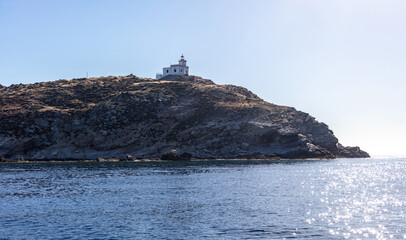 Cape Korax or Akra Korakas with lighthouse at Paros island Naoussa village  Cyclades Greece. - obrazy, fototapety, plakaty