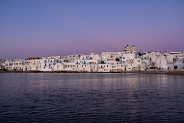 Obraz premium Paros island Greece. Sunset over Naoussa village Cyclades. Summer destination.