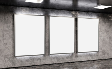 Fototapeta premium Three blank billboards on underground subway wall Mockup. Hoardings advertising triptych on train station interior 3D rendering