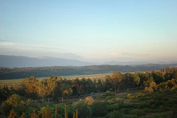 Naklejka premium Bird's-eye view of the mountains. Sunset over Pitsunda. Natural landscape at sunset.