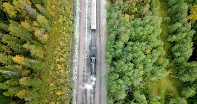 Steam locomotive connects with the cars from the Ruskeala Express along the route Sortavala - Ruskeala Mountain Park in Sortavala region of Republic of Karelia Russian