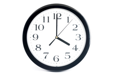 Black classic clock on isolated white background.