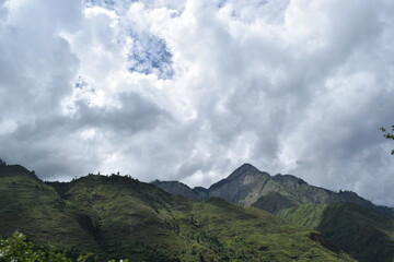 clouds and mountains and river