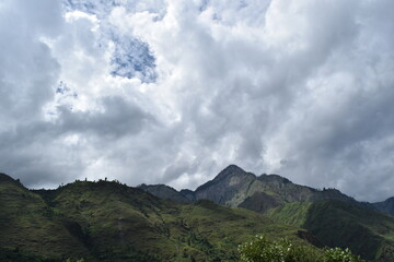 Fototapeta premium clouds and mountains and river