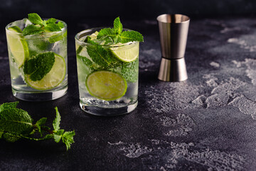 Refreshing summer alcoholic cocktail mojito with ice, fresh mint and lime