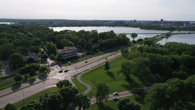 Flying over Olin Park and Looking Towards Downtown Madison in Summer (Drone - Tilting Right)